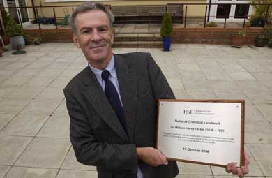 William Perkin's great-grandson Michael Kirkpatrick with a commemorative plaque at Sudbury Neighbourhood Centre