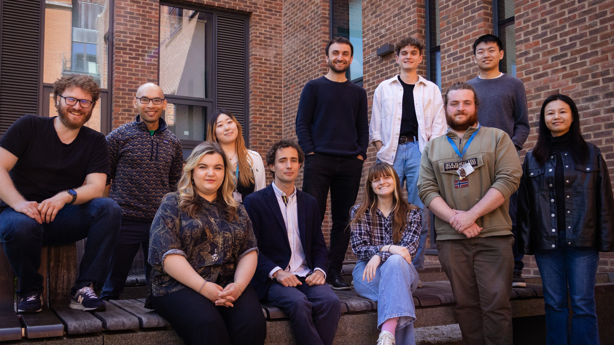 Dr Pietro Sormanni with a group of colleagues outside the Chemistry for Health building