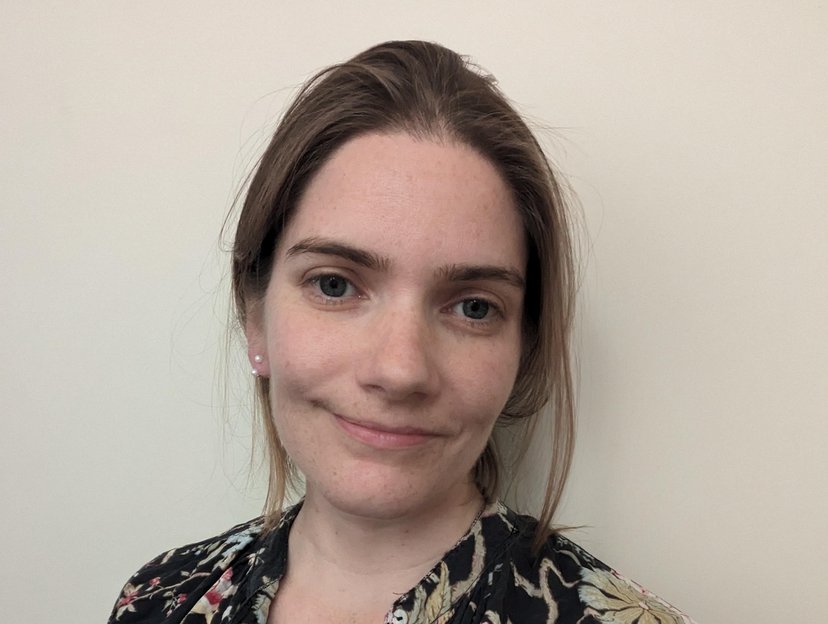 A head-and-shoulders photograph of Izzi Monk