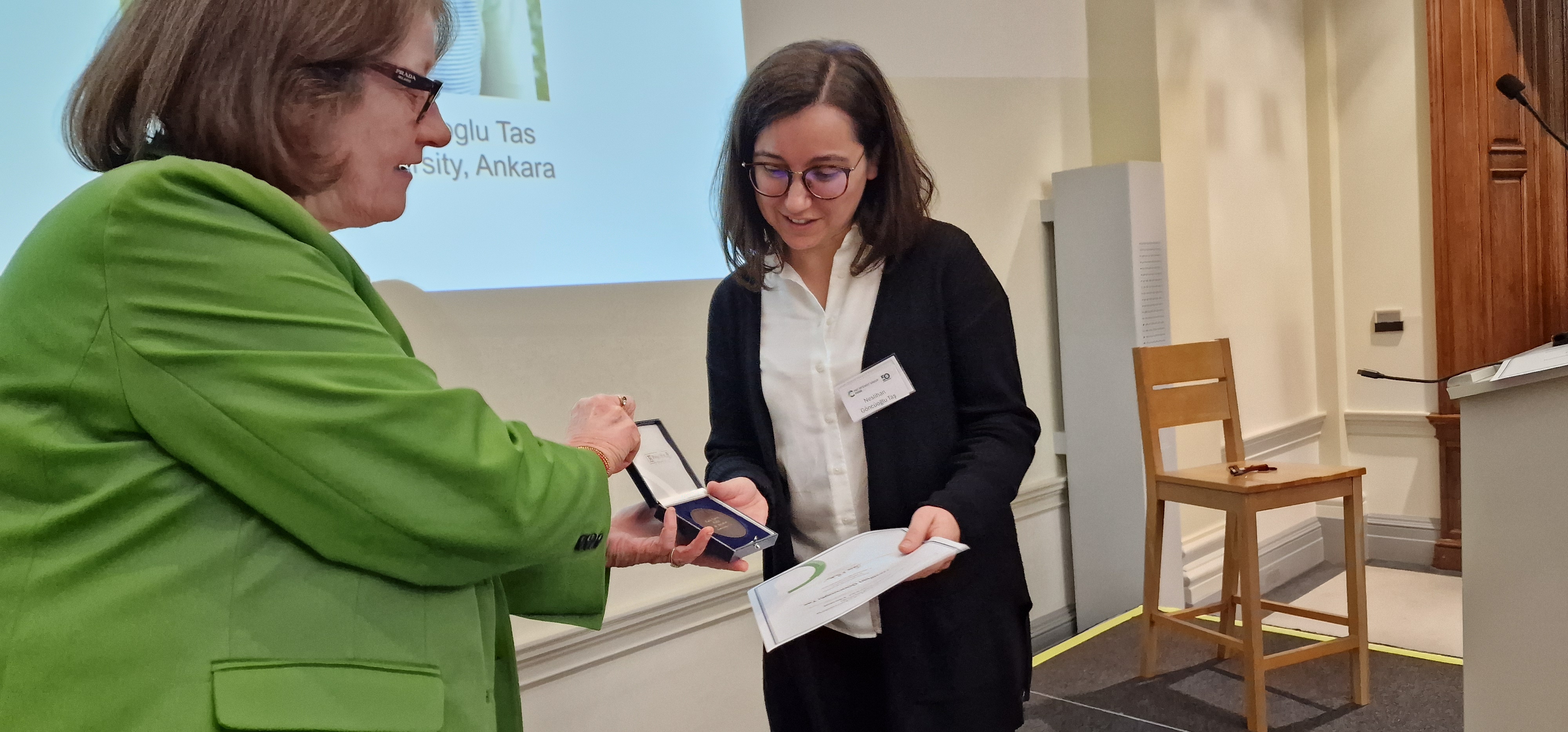 Dr Neslihan Göncüoğlu Taş, right, receives the 2023 Early Career Medal from RSC Food Group Chair Professor Jane K Parker