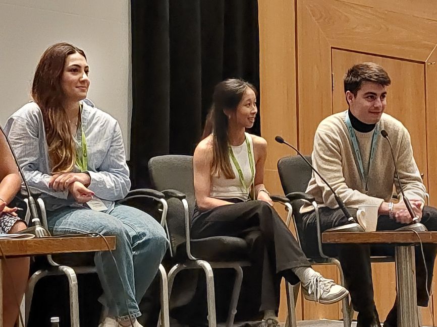 One of the participants in a panel discussion talks to the crowd