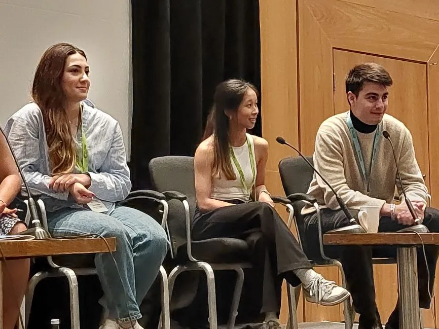 One of the participants in a panel discussion talks to the crowd