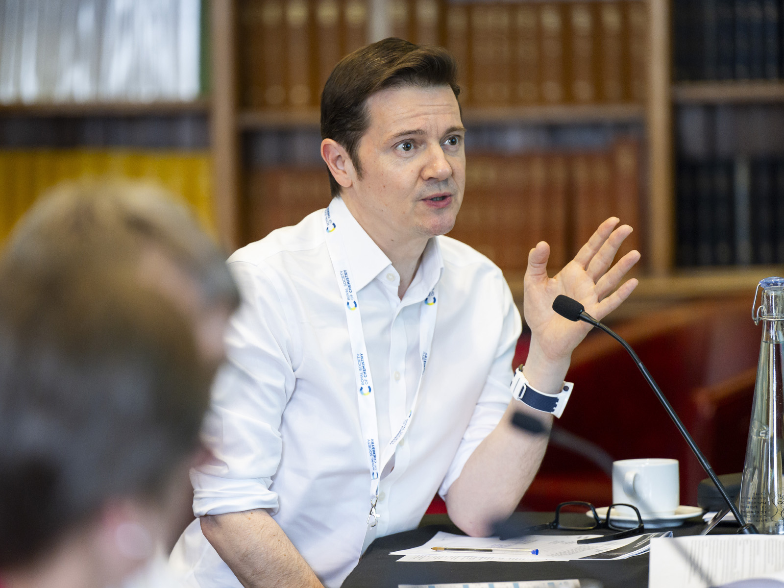 A judge asks a question of the presenting groups