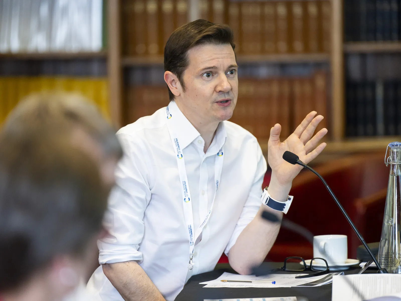 A judge asks a question of the presenting groups