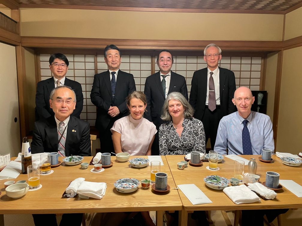 Group of people sitting at dining table