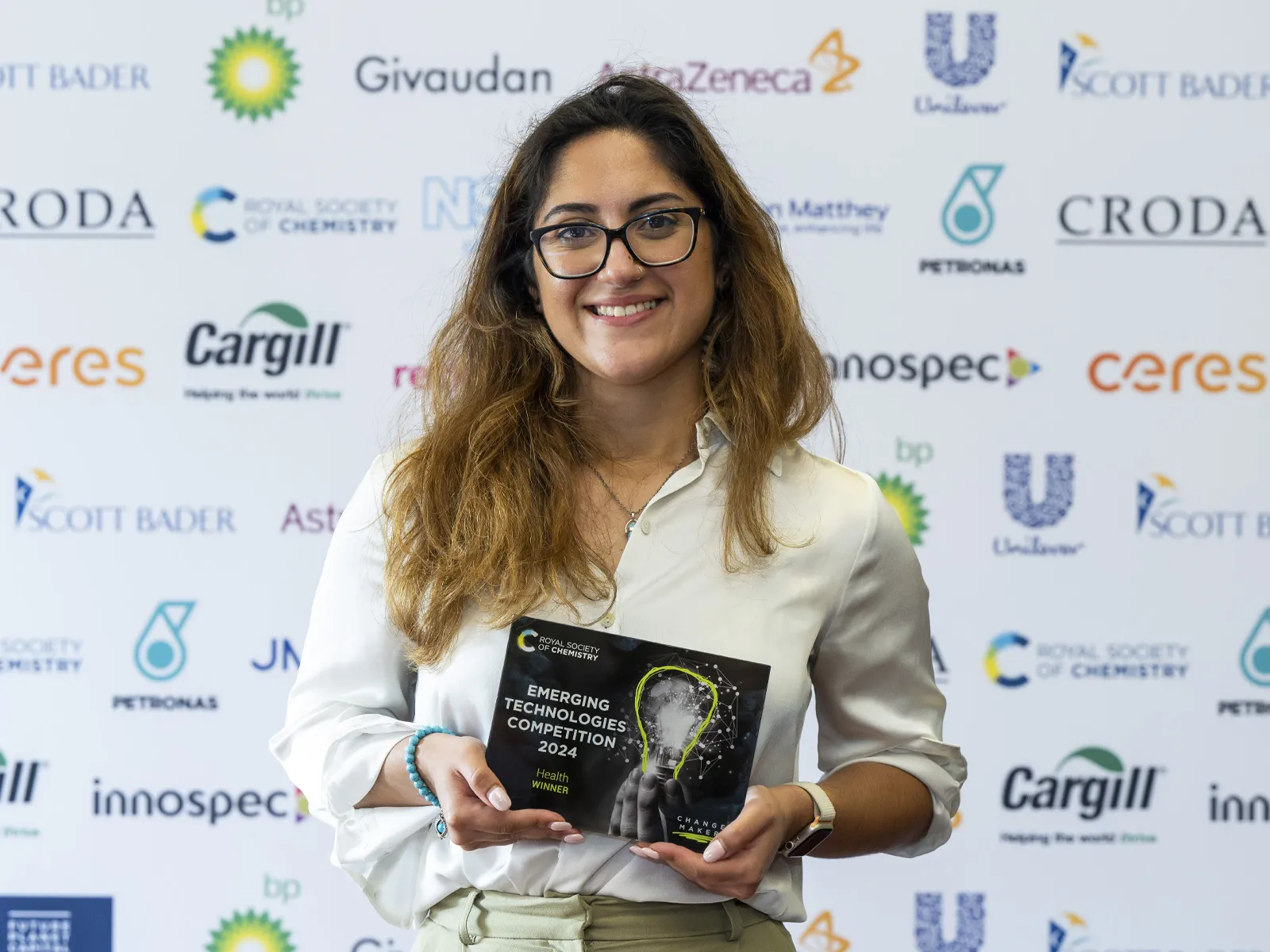 Ignota Labs'  chief data science officer Layla Hosseini-Gerami holds the 2024 Health award at the Emerging Technologies Competition 2024 final