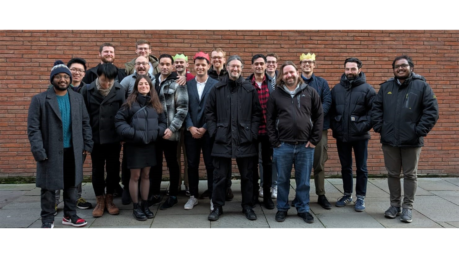 a group of people posing for a photo