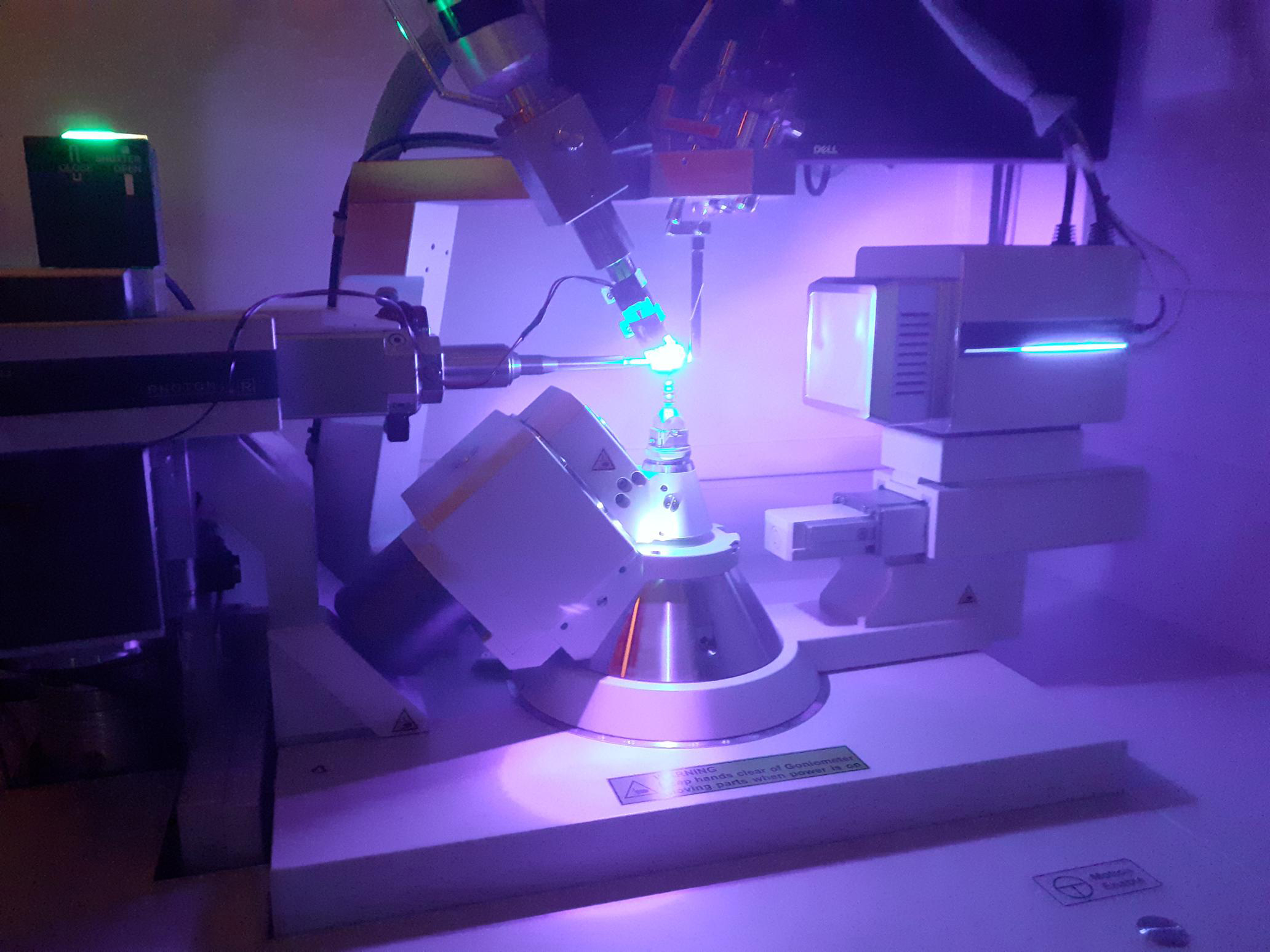a lab machine with a purple light in Dr Lauren Hatcher's lab