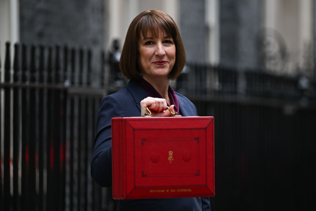 Chancellor of the Exchequer Rachel Reeves MP smiles and holds aloft a red dispatch box ahead of her Budget presentation to Parliament Chancellor of the Exchequer Rachel Reeves MP smiles and holds aloft a red dispatch box ahead of her Budget presentation to Parliament