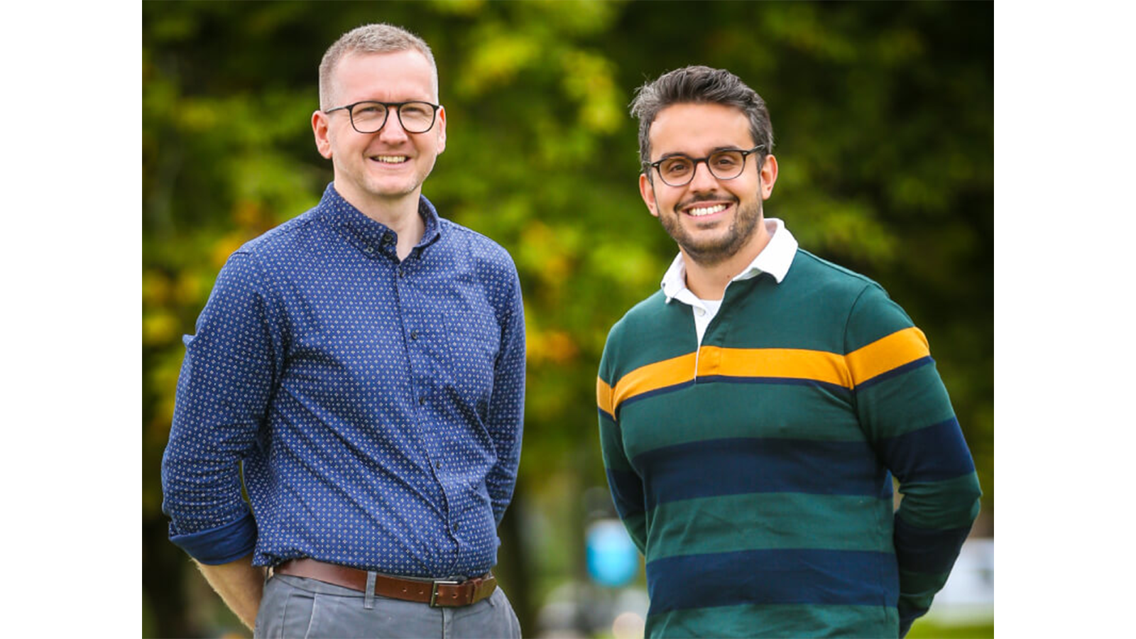 Two of the We are Chemistry team standing together smiling