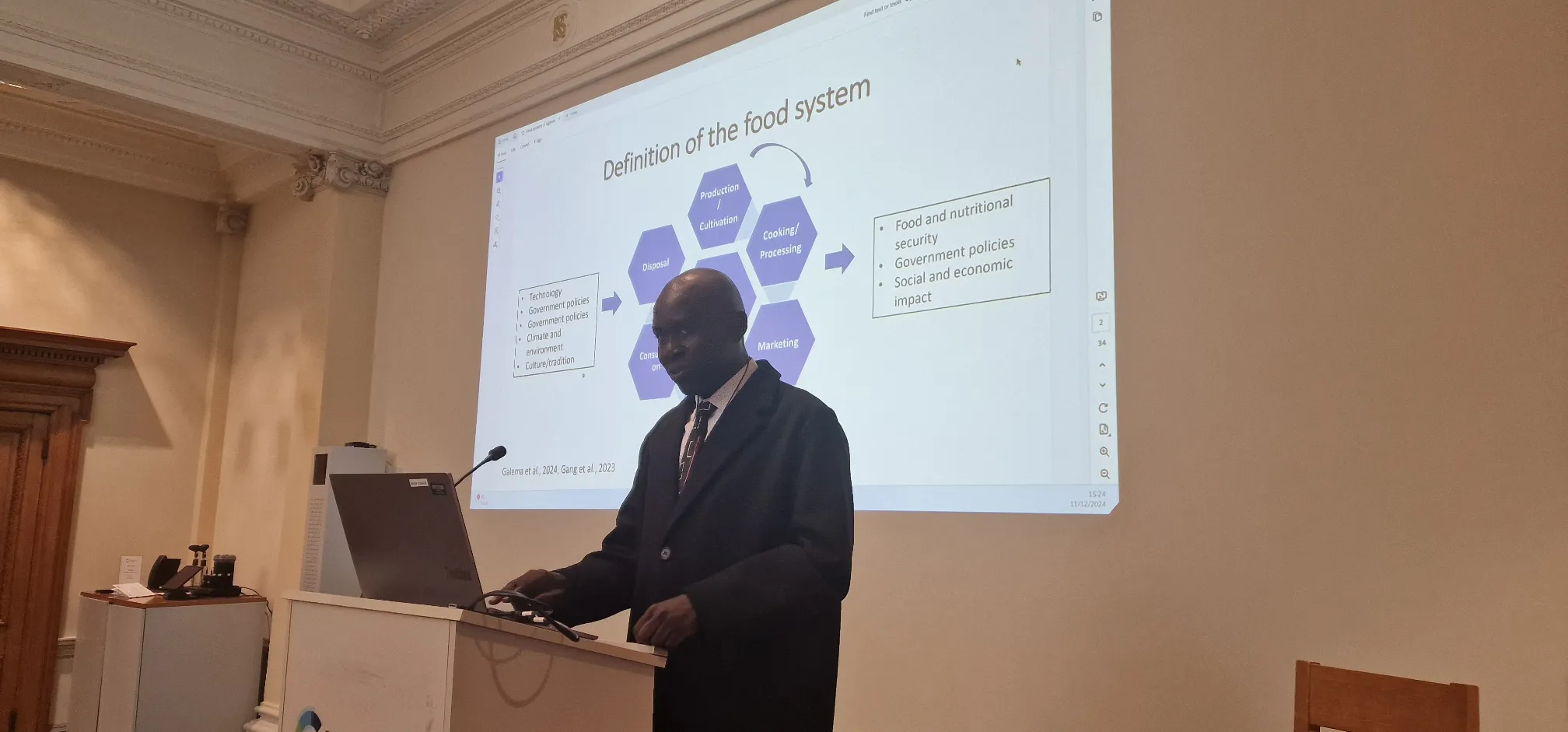 Dr Francis Omujal, of Uganda's Ministry of Health, gives a presentation on the food system in his homeland
