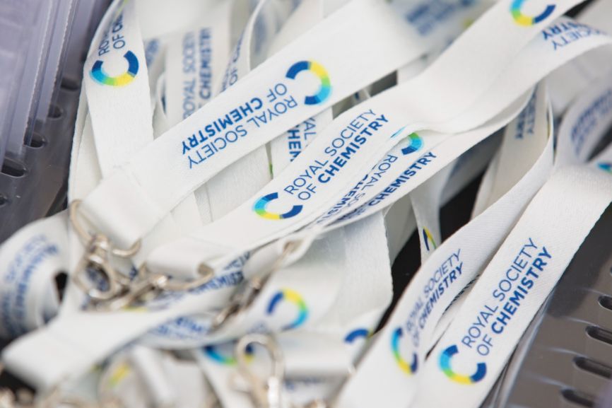 Lanyards are prepared for the hundreds of delegates at the Science and the Parliament event