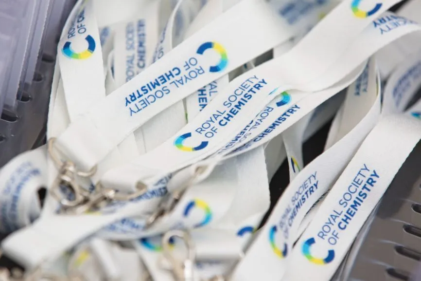 Lanyards are prepared for the hundreds of delegates at the Science and the Parliament event