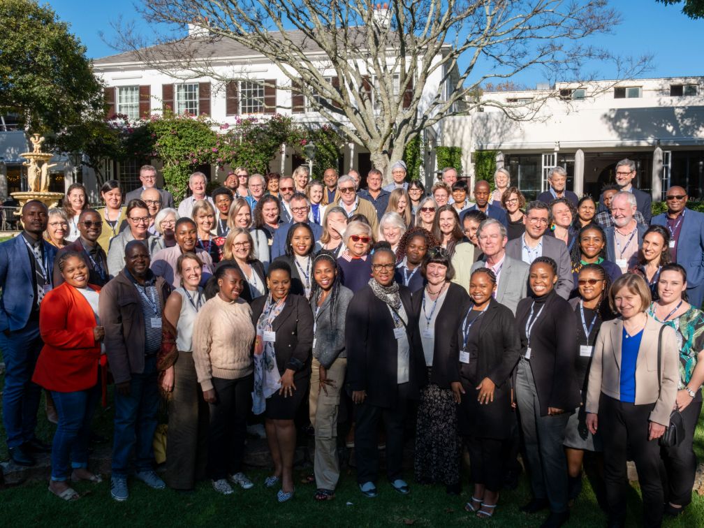 Group of people posing outside for photo