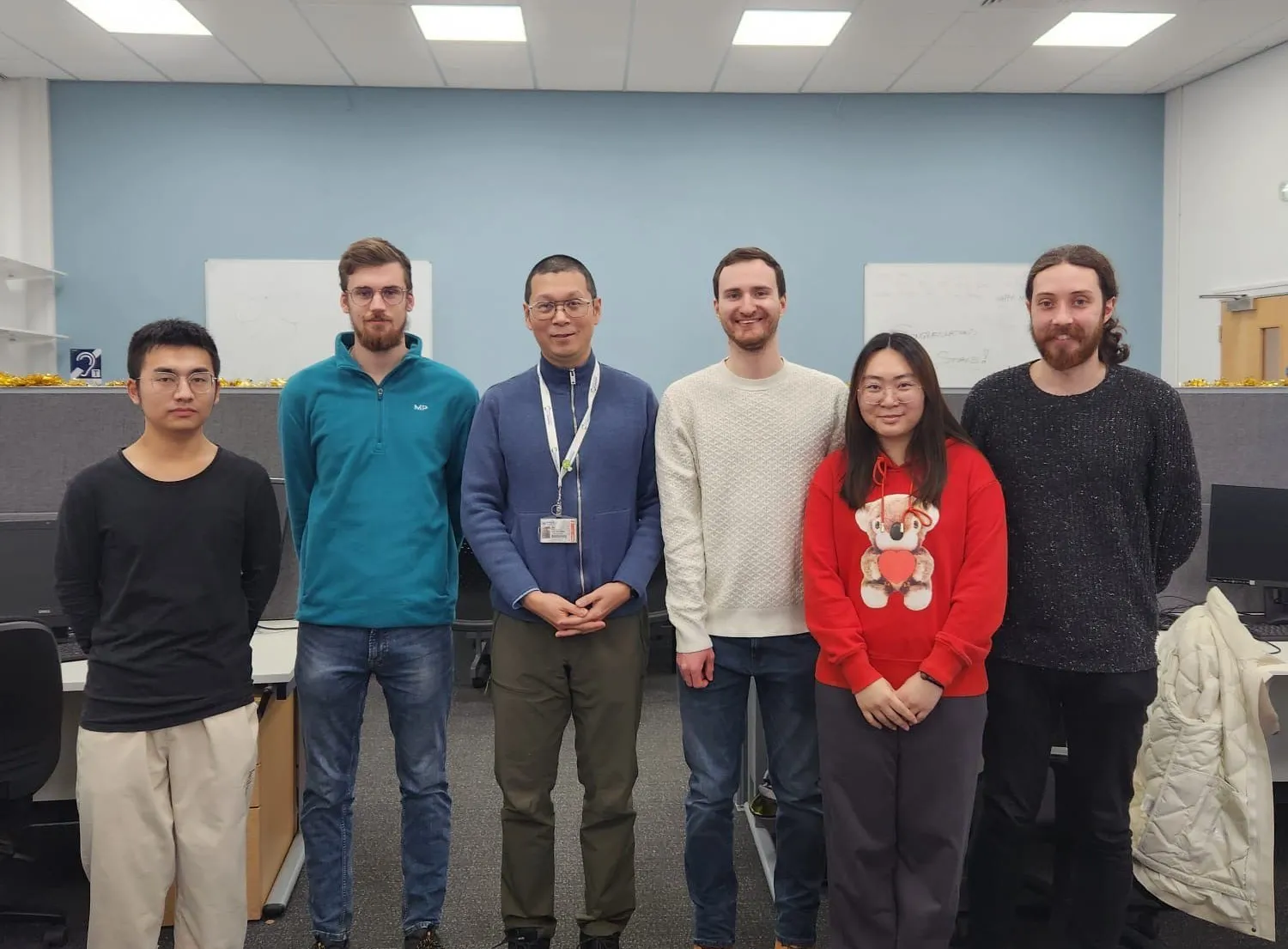 EPSRC NRF for EPR team members standing looking to camera