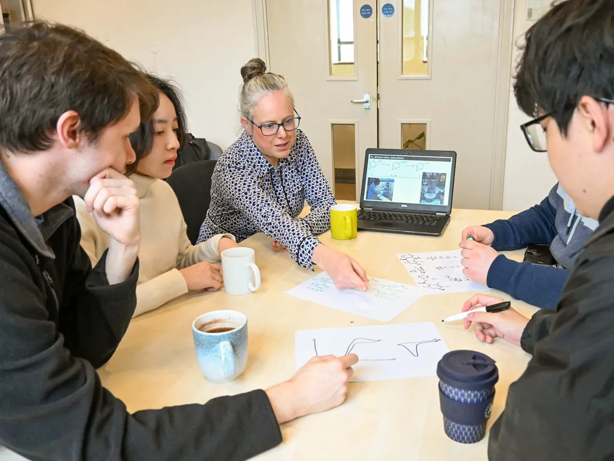 Biocatalytic Nitro Hydrogenations team working around a table