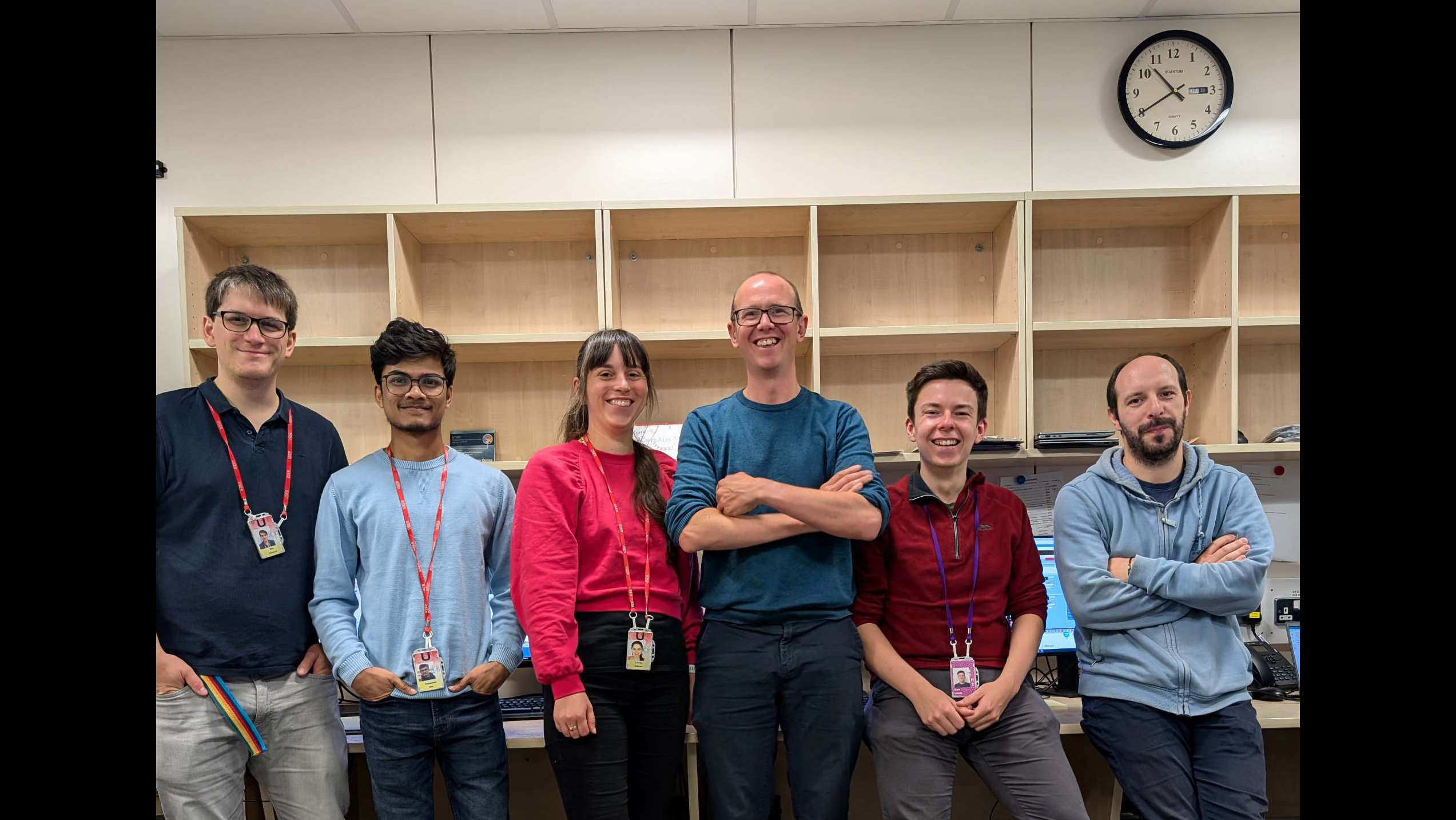 Dr Lauren Hatcher a group of people posing for a photo