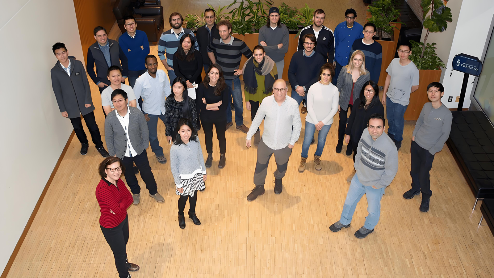 Gas-phase Heterogeneous Catalysis for Solar Fuels Research team posing as a group to the camera, standing in their office