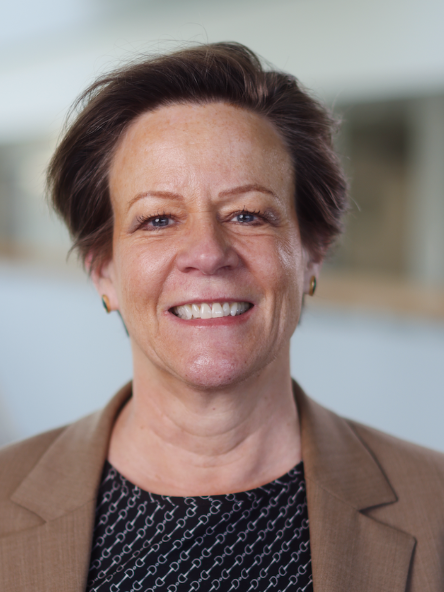 Professor Donna Blackmond smiling at camera