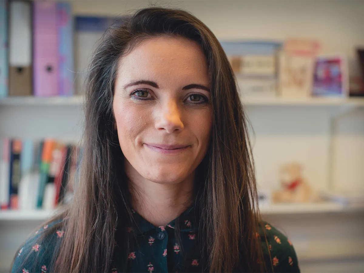 Professor Rebecca Melen smiling at camera
