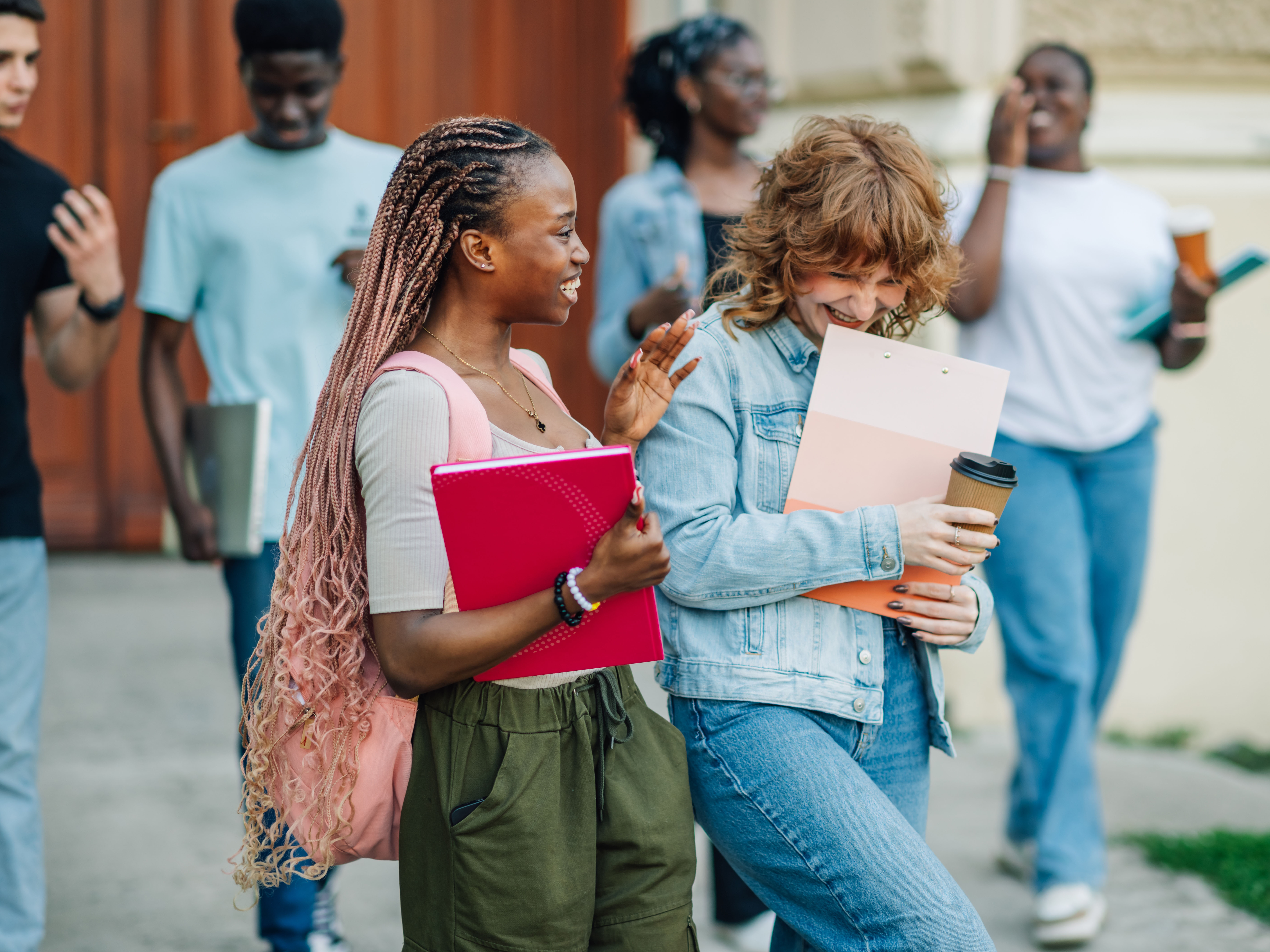 group of university students talking outside