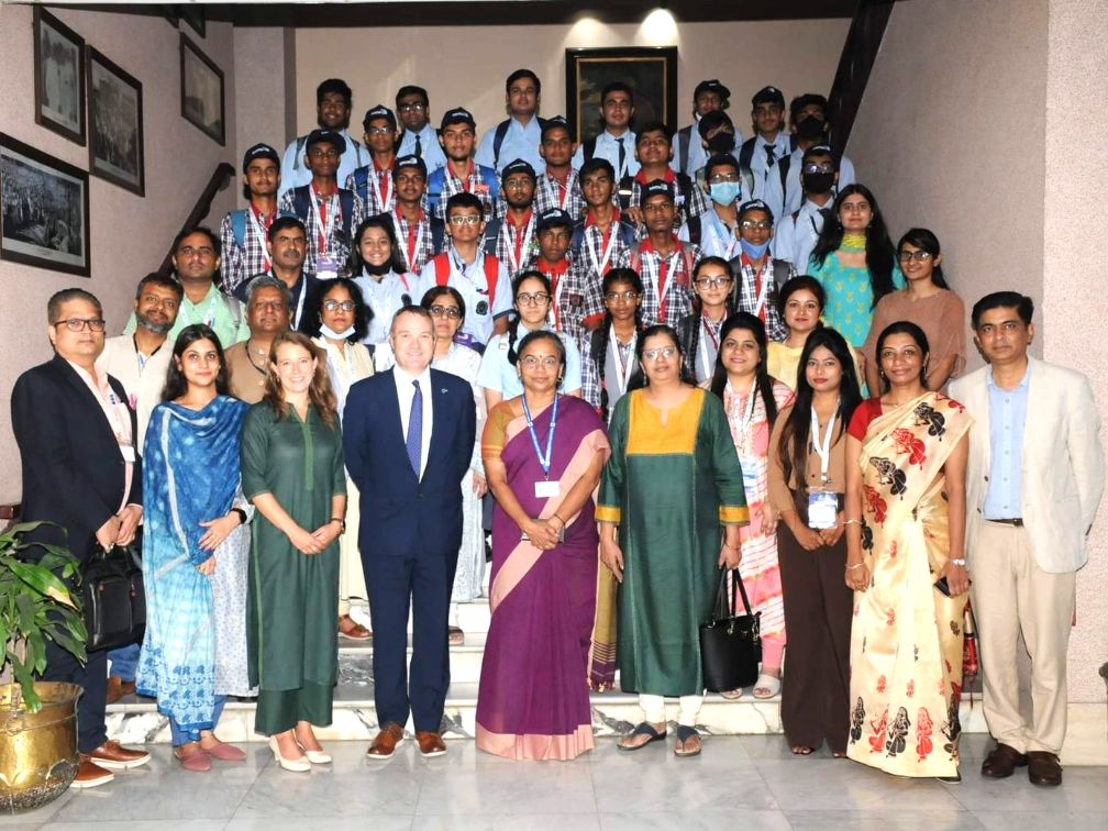 Group of people posing for photo