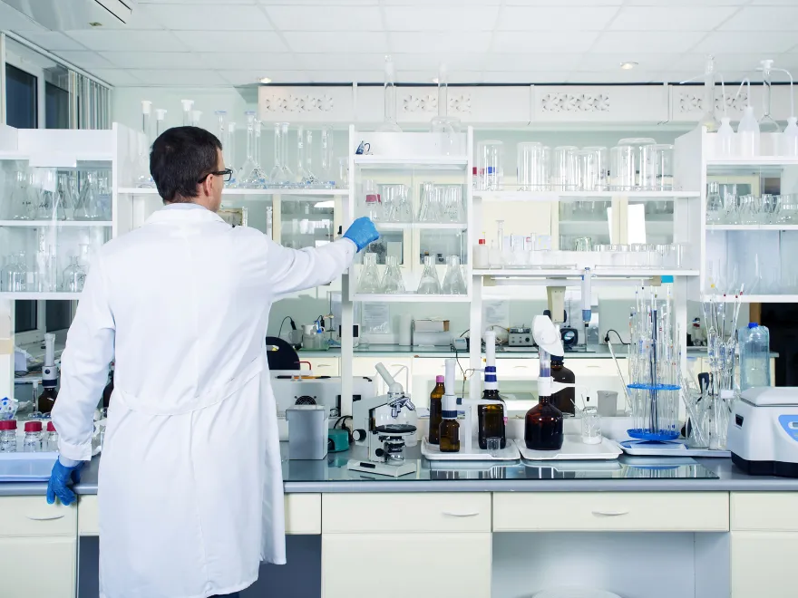 Student doing practical work in a teaching lab
