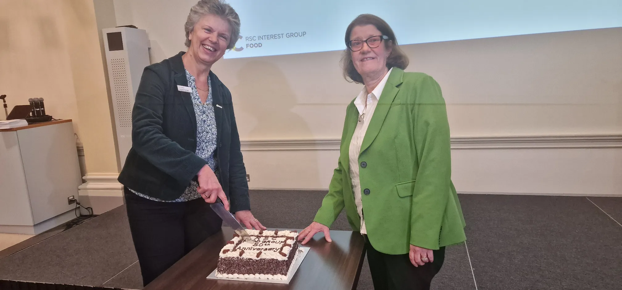 RSC Past President Professor Gill Reid and RSC Food Group Chair Professor Jane K Parker with a cake marking the 50th anniversary of the Food Group