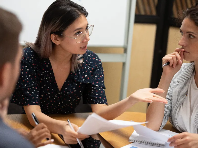 A group of colleagues discussing project ideas or research