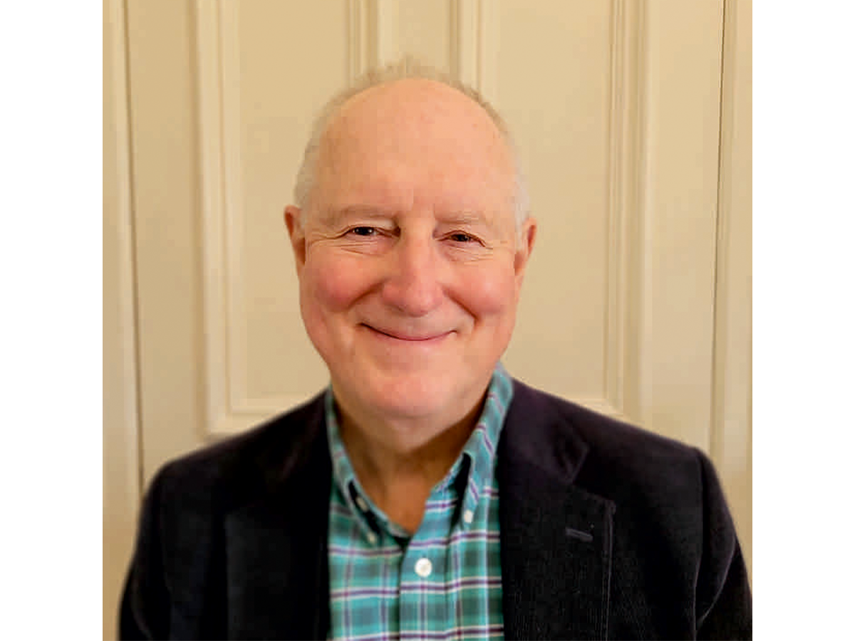 a man smiling at camera