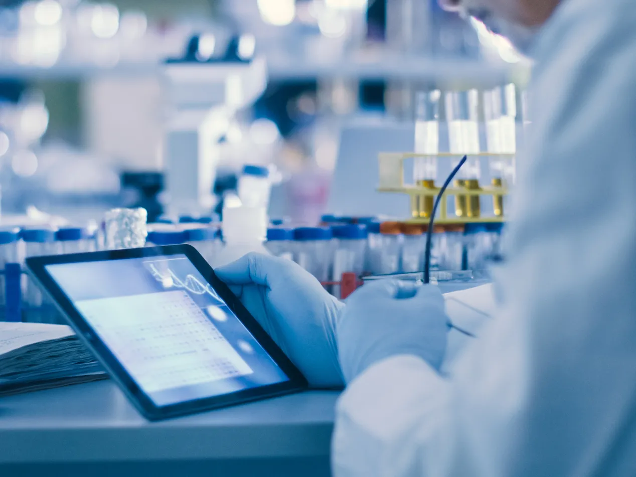 Scientist using an iPad for medical research