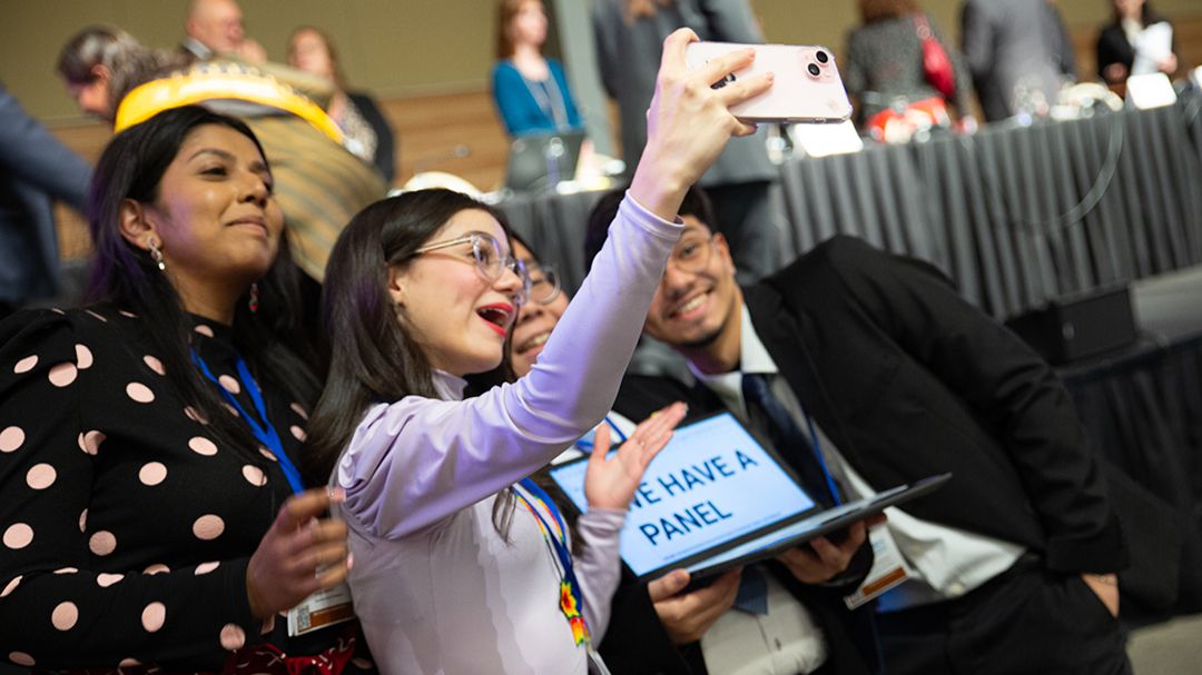 Representatives from the Youth Major Group celebrate the announcement that the panel had been ratified