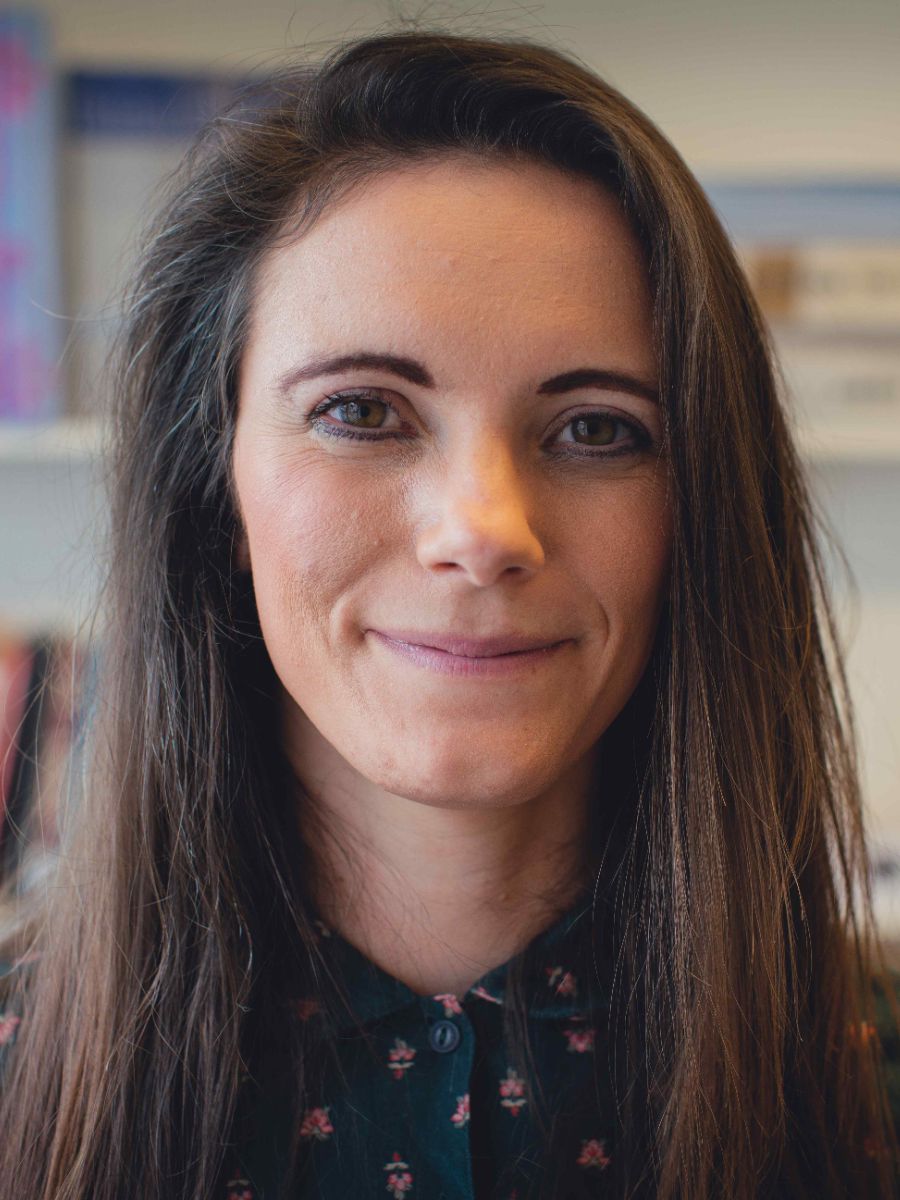 Professor Rebecca Melen smiling at camera