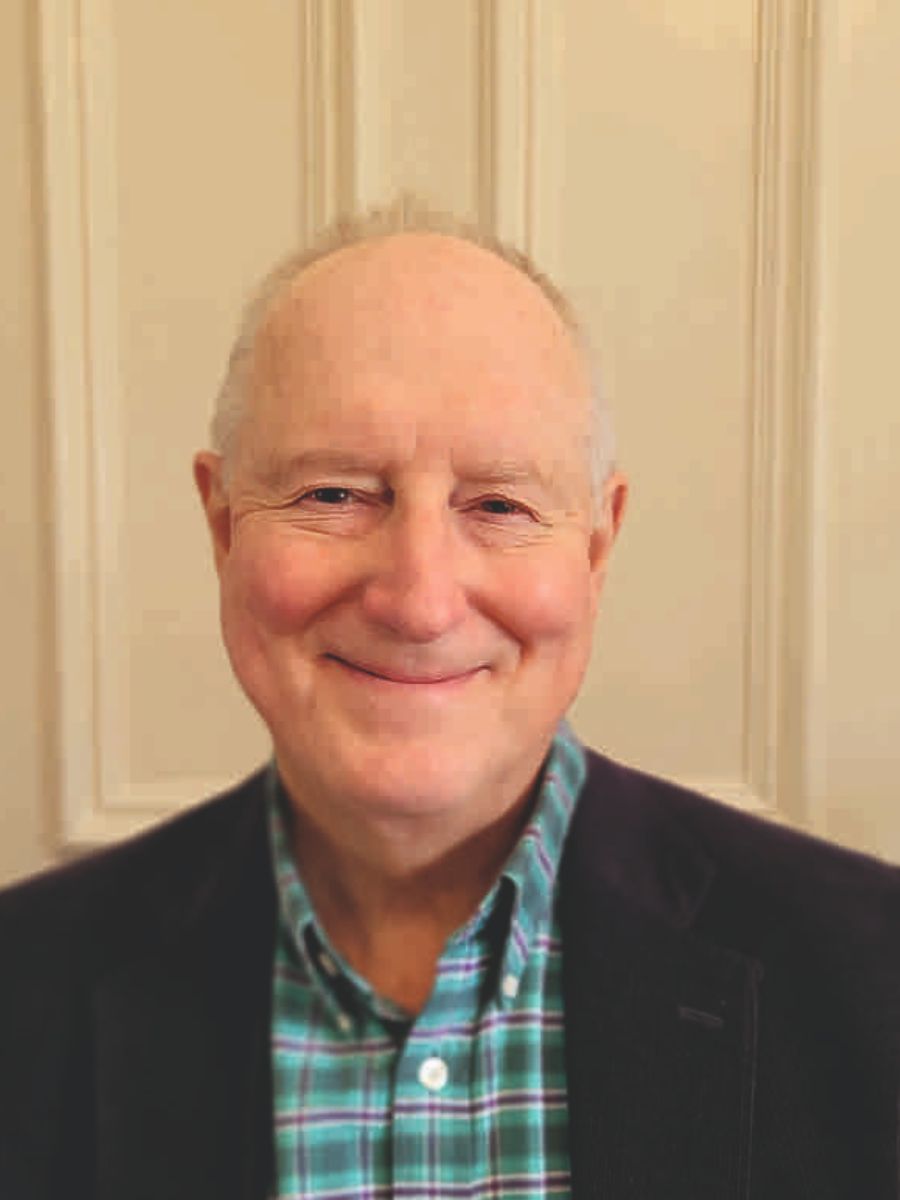 Professor John Plane smiling at camera