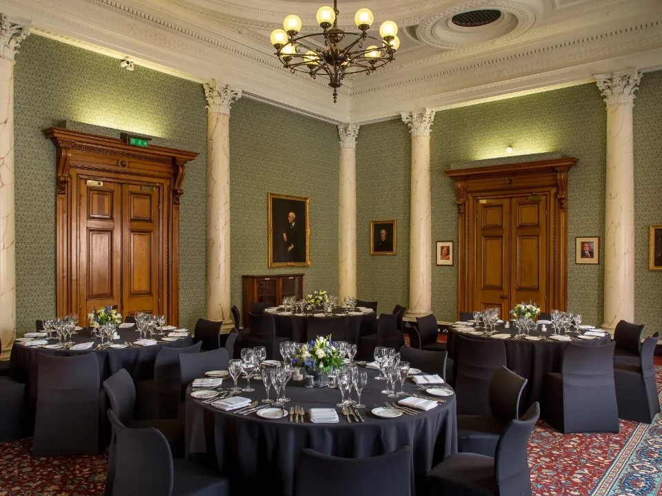 Council room with four dining tables at RSC Burlington House