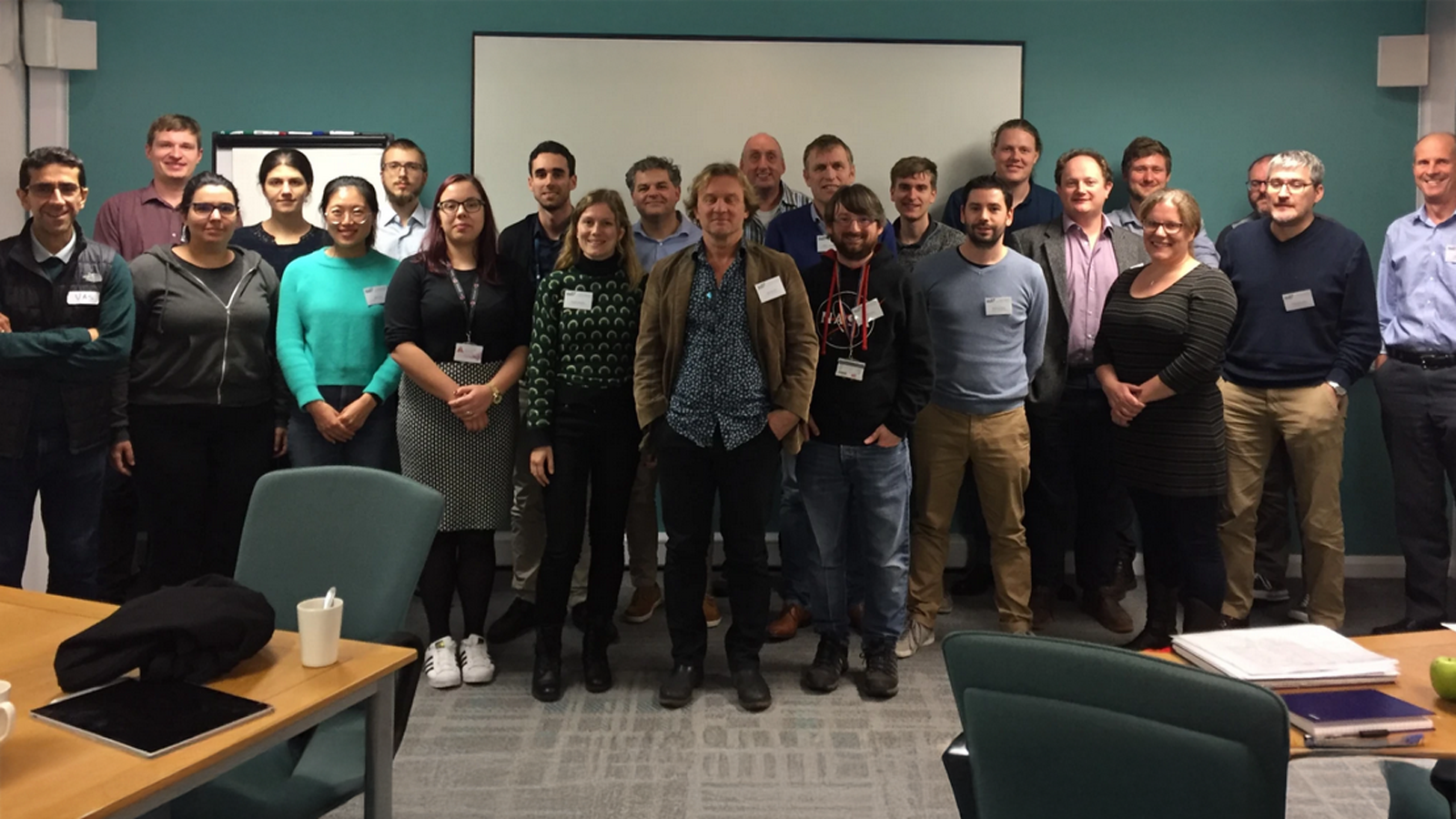 The BoostCrop team facing camera in a big group in an office