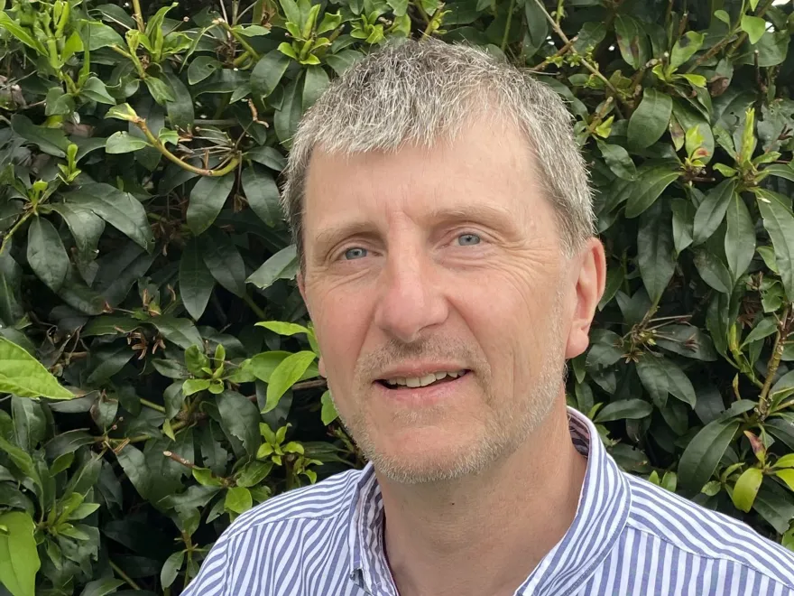 headshot of john collins