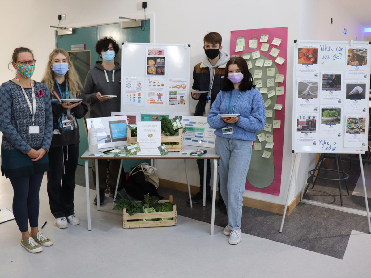 5 students with their sustainability stand