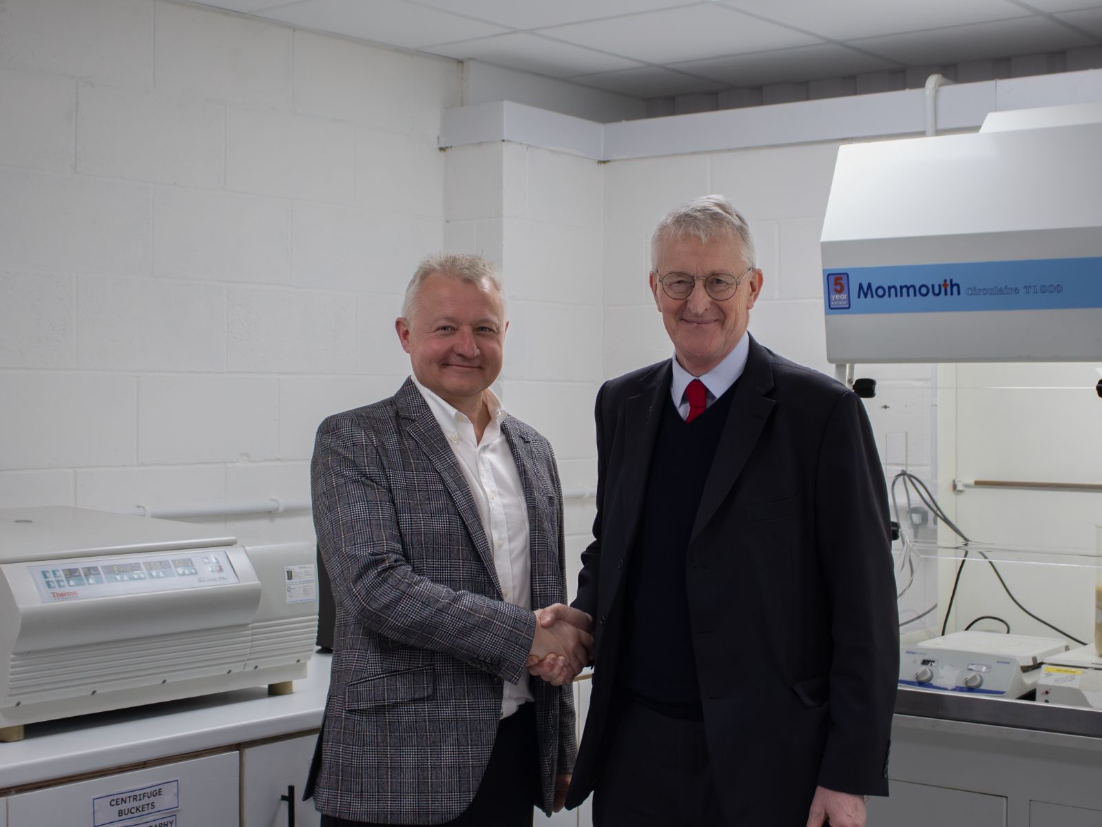 Andrew Waterworth, Manager of Impact Investment Initiatives, shakes hands with Hilary Benn MP