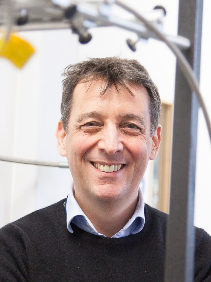 Professor Paul Walton smiling at camera