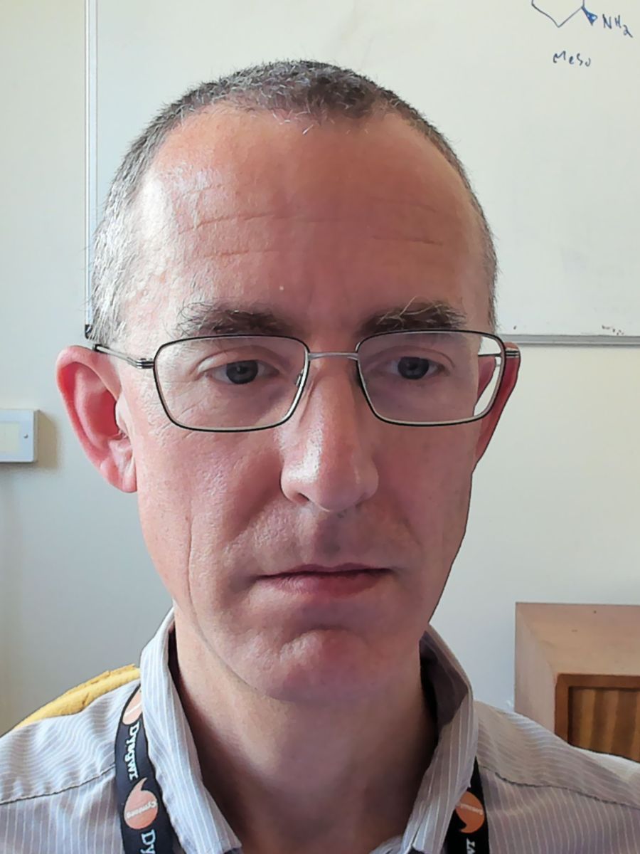 Dr James Redman wearing glasses